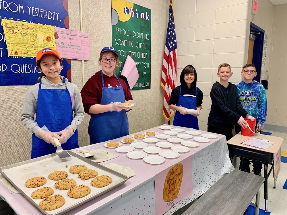 5th grade students proudly ready to work their Cookie Sale