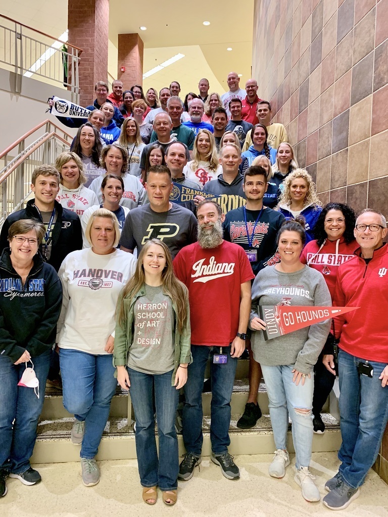 PHS teachers wearing their alma mater shirts for College Go! Week.