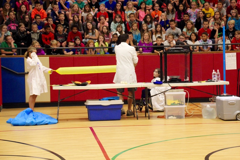 During the "Tornado in a Box" station, students learned how air molecules react to pressure.
