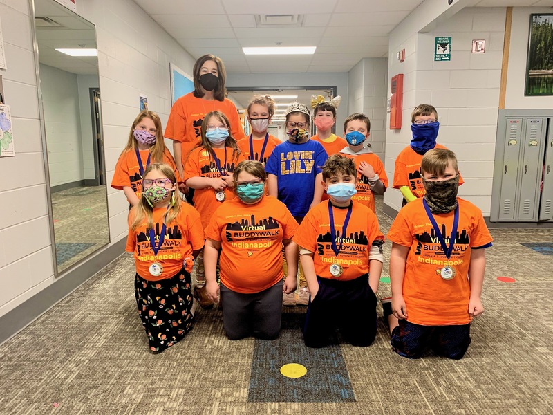 Some of Lily's classmates, proudly standing with their friend