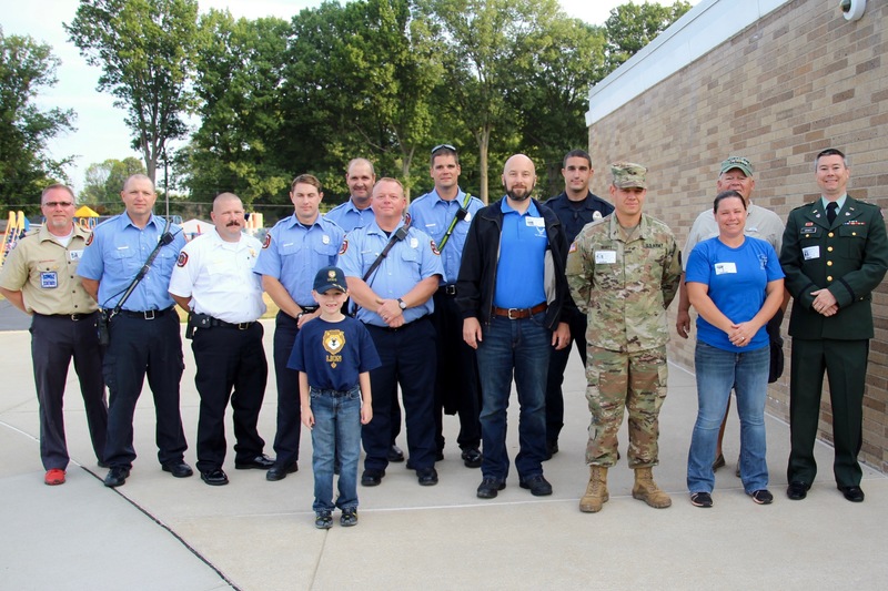 These first responders and veterans, along with Brentwood scout leader and scout, took part in this morning's "High Five for Heroes."