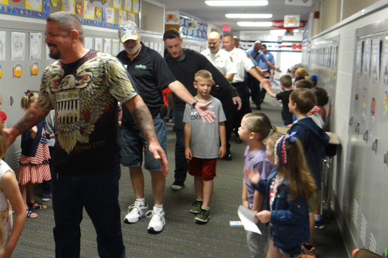Honoring our veterans, who often were accompanied by their children or relatives, is a big part of the "High Fives for Heroes" event