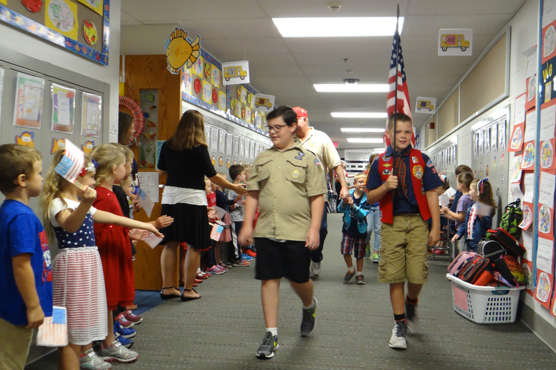 At @cnquakers, Boy Scouts carried the flag and led the way for the honored guests