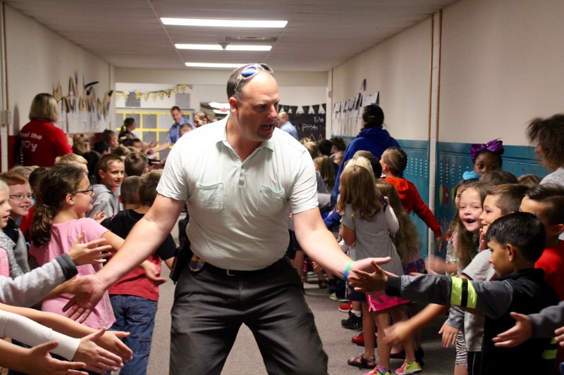 Plainfield Police Detective Bugler never misses an outstretched hand!