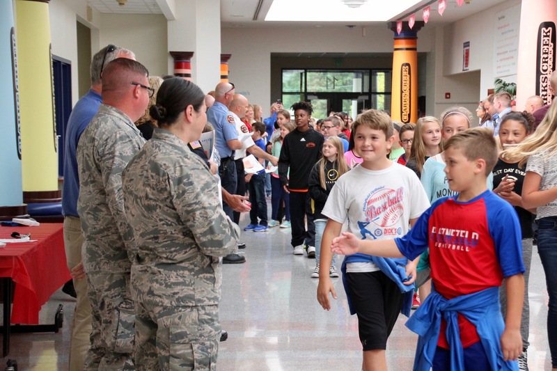 Clarks Creek students present members of the military with cards and letters on Patriot Day