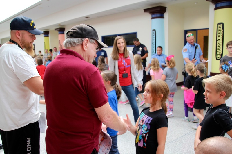 Clarks Creek students present members of the military with cards and letters on Patriot Day