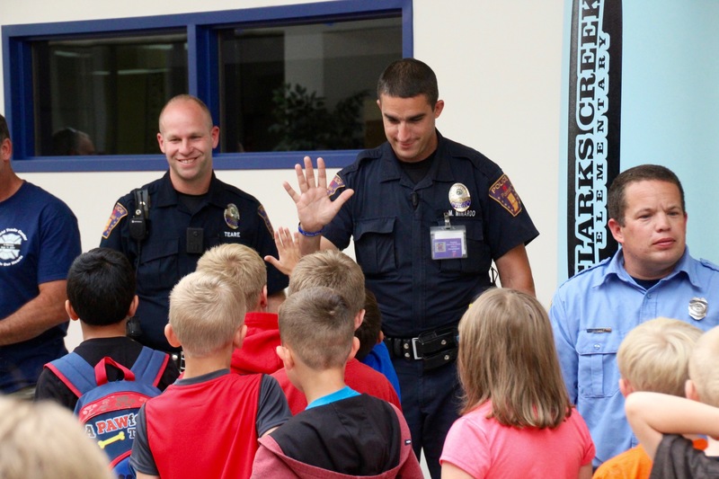 Clarks Creek students present members of the military with cards and letters on Patriot Day