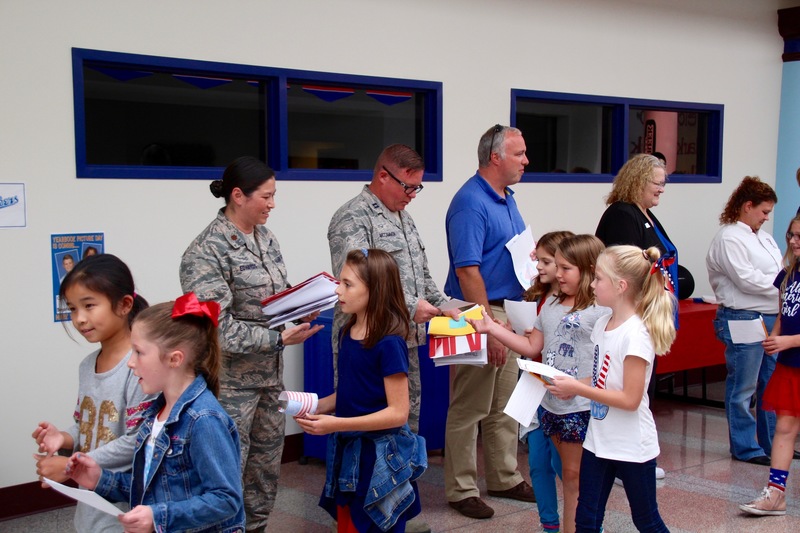 Clarks Creek students present members of the military with cards and letters on Patriot Day