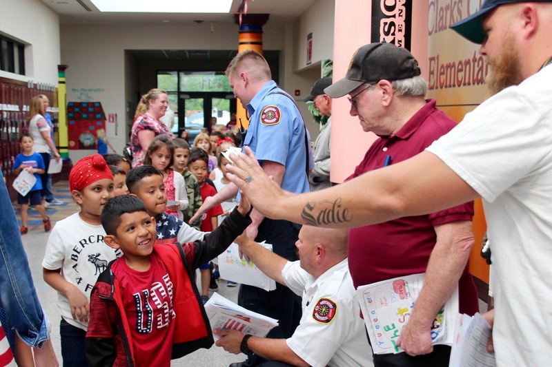 Clarks Creek students present members of the military with cards and letters on Patriot Day