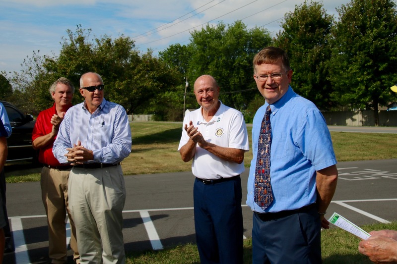 Scott Flood (PCSC School Board), Scott Olinger (PCSC Superintendent) and John Baer (Plainfield Rotary) applaud Brad DeHoff for his accomplishments and his service to the students of Plainfield.