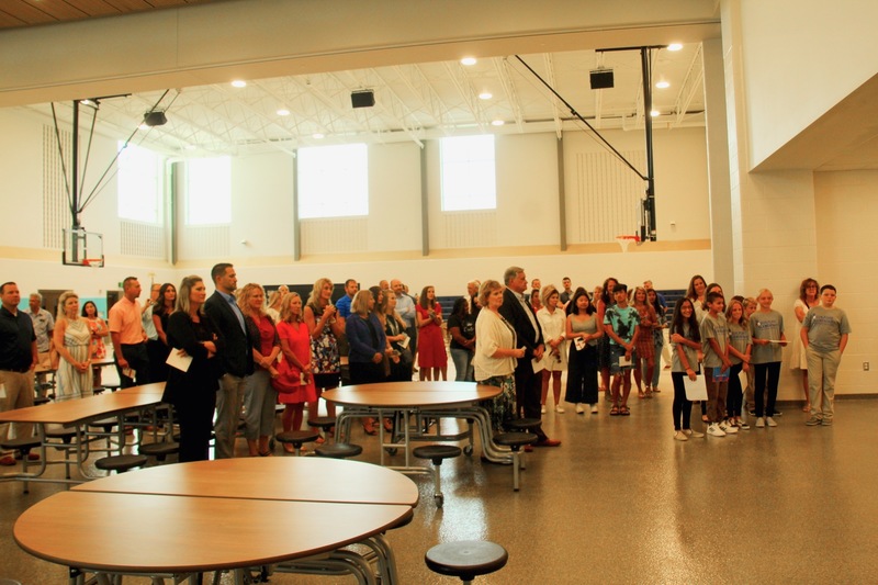 Town and school officials gather to celebrate the ribbon-cutting at Guilford Elementary School.