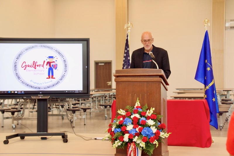 Superintendent Scott Olinger speaks to guests during the Guilford Elementary School ribbon-cutting ceremony