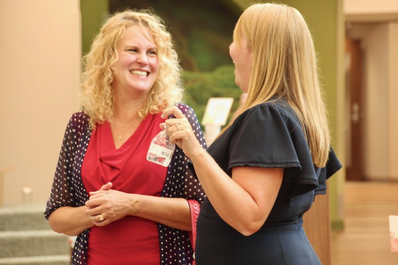 Clarks Creek Principal, Marisa Donovan, visits with her friend and colleague, Guilford Elementary Principal Colleen Perry