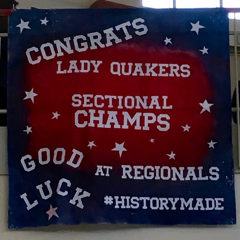 Congratulatory banner hangs in the high school ellipse