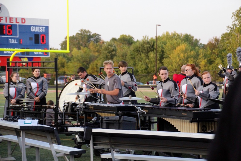 The drum line does a remarkable job of working together while focusing on their individual parts.