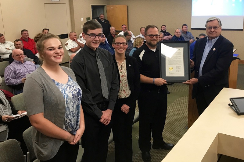At last night's Town Council meeting, President Robin Brandgard presented Mr. Carpenter and the Red Pride Marching Band's drum majors with a proclamation celebrating their state championship.