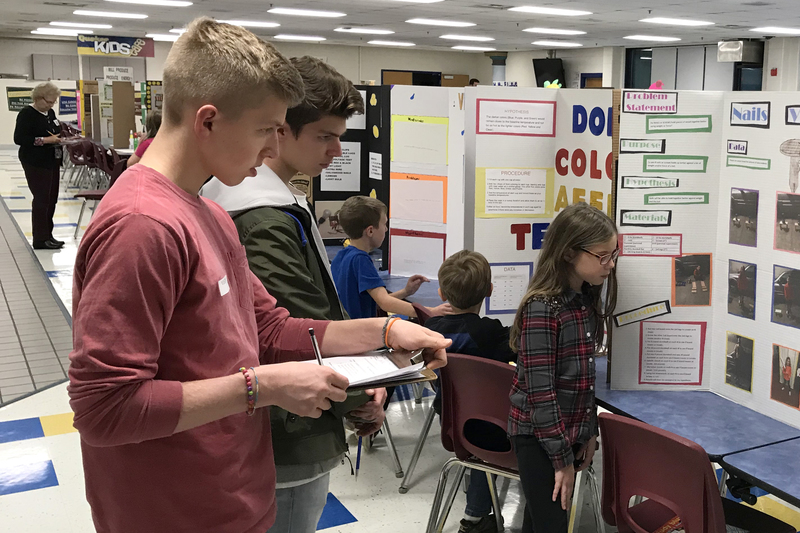 PHS Dual Credit Science students providing the judging for the Clarks Creek Science Fair this year.