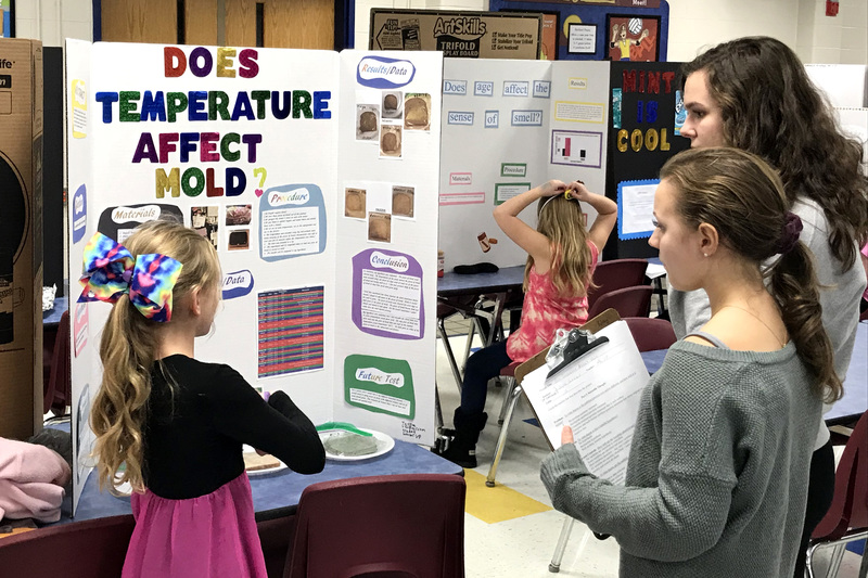 PHS Dual Credit Science students providing the judging for the Clarks Creek Science Fair this year.