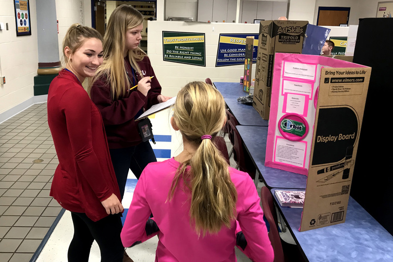 PHS Dual Credit Science students providing the judging for the Clarks Creek Science Fair this year.