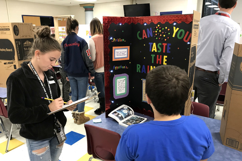 PHS Dual Credit Science students providing the judging for the Clarks Creek Science Fair this year.