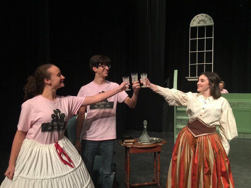 Logan Eddington, Stephen Avilez and Abby Moyers rehearse one of their scenes for today's performances of "Little Women: The Musical"