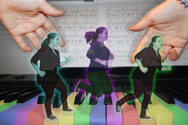 Emily Wood used PhotoShop to create this image of herself running across the rainbow-hued keys of a piano.