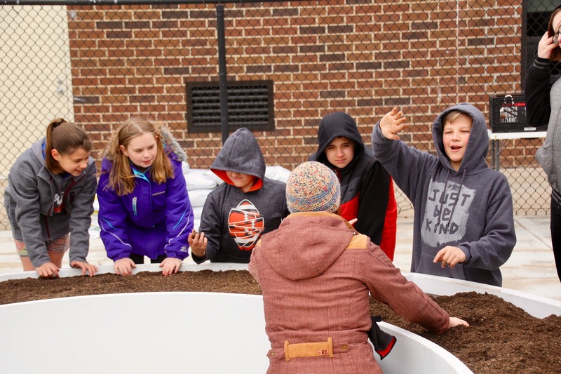 5th grade students prepared the soil for the first planting of peas and lettuce.