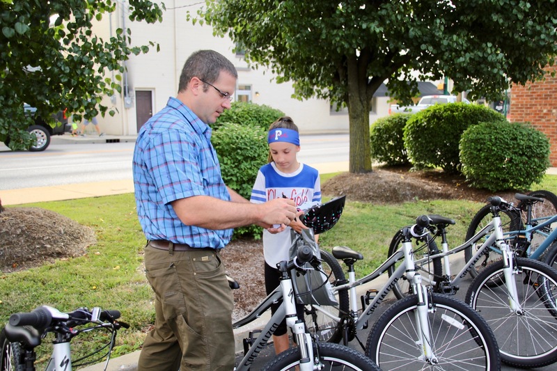 Daniel Gibbs, reviewing safety information with one of the Central students