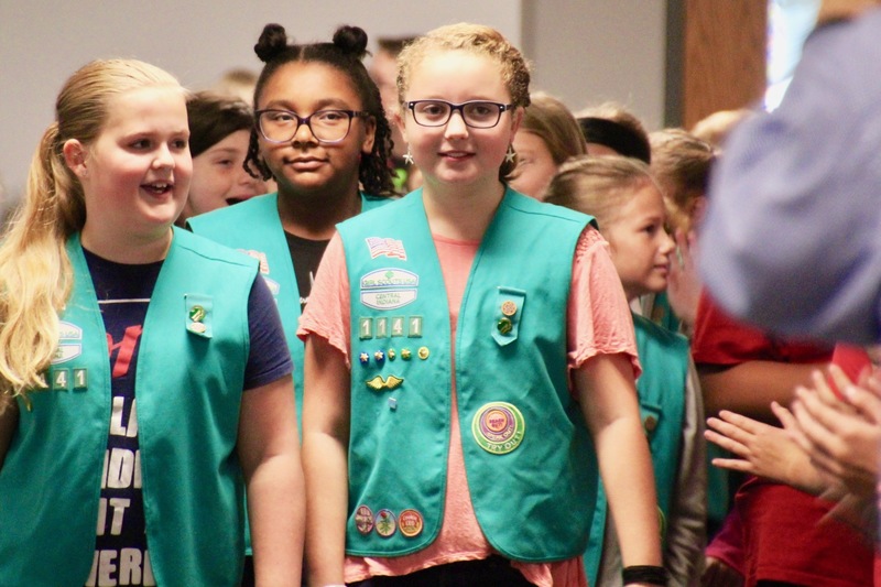 Elementary members of the Boy and Girl Scouts led their special guests on the parade through their schools.