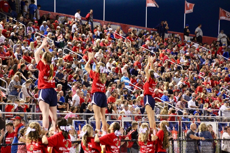 PHS Cheerleaders lead the crowd in a cheer during Homecoming