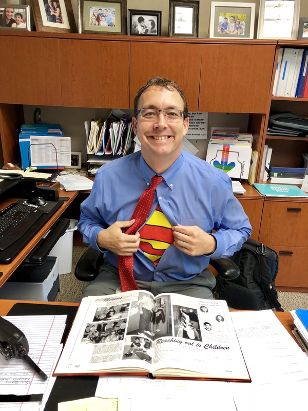 PHS Assistant Principal Brent Schwanekamp shows off his Clark Kent attire during Favorite TV/Book Character day