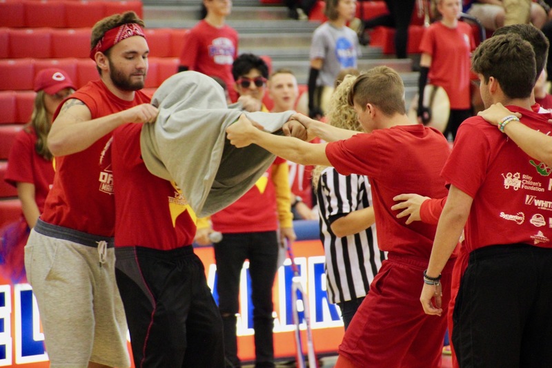 One of the Pep Session games required several male students to exchange a t-shirt with their arms connected