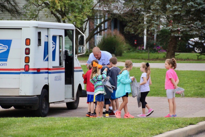 Exploring the mail truck was great fun, plus the mail carrier had candy to share!