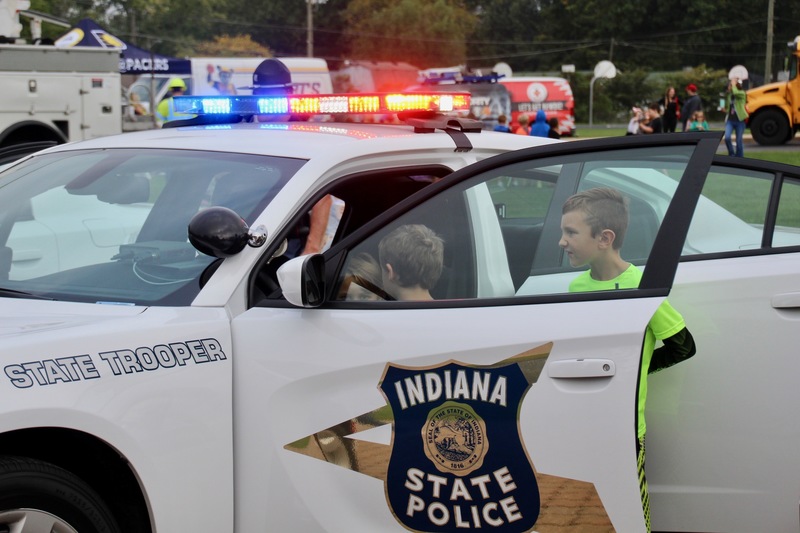 Students loved climbing into the police cars and turning on the sirens