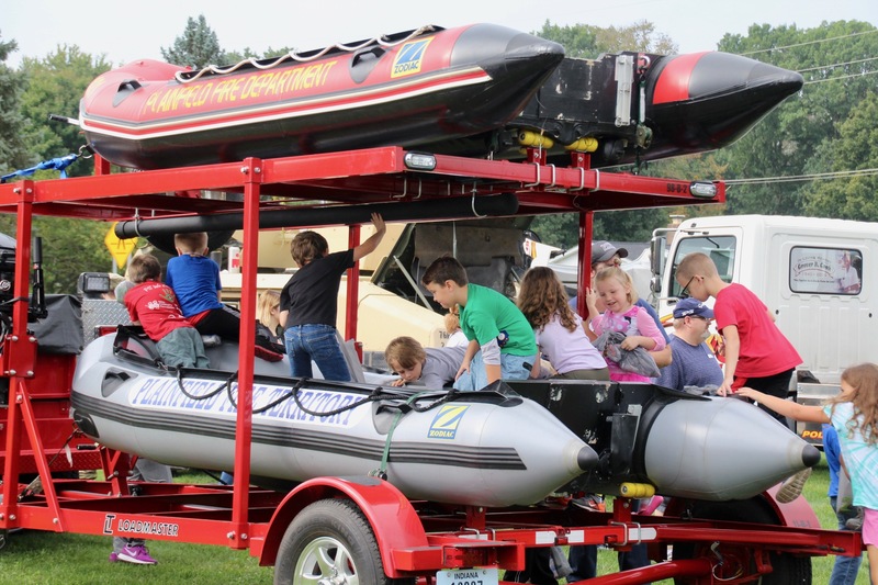 The Plainfield Fire Territory brought their boat hauler, and students loved climbing on board the water rescue boats