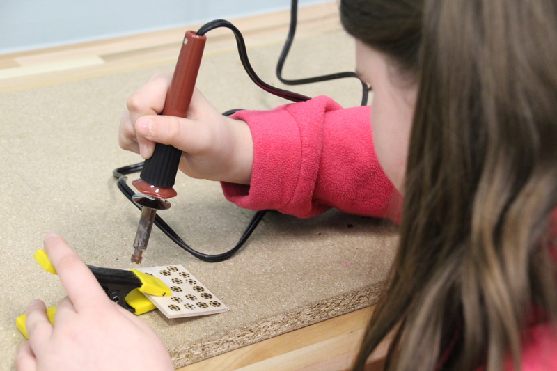 Students enjoyed working with the wood-burning tools