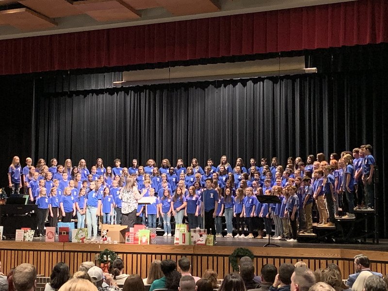 The PCMS choir on stage during their Winter Concert.