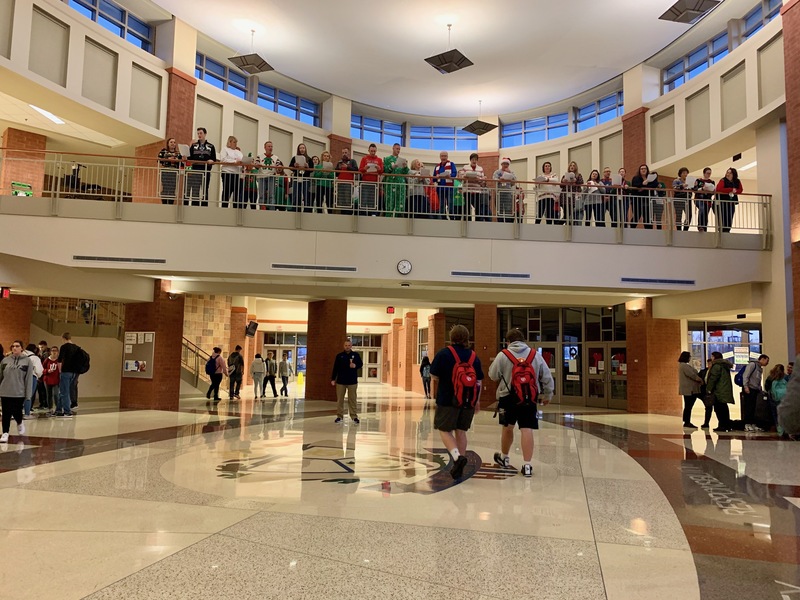 PHS teachers caroling as students gather in the Ellipse on the last day of final exams.